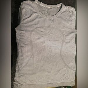 Lululemon swiftly relaxed size 10. EUC. One area that is “pulled” is pictured